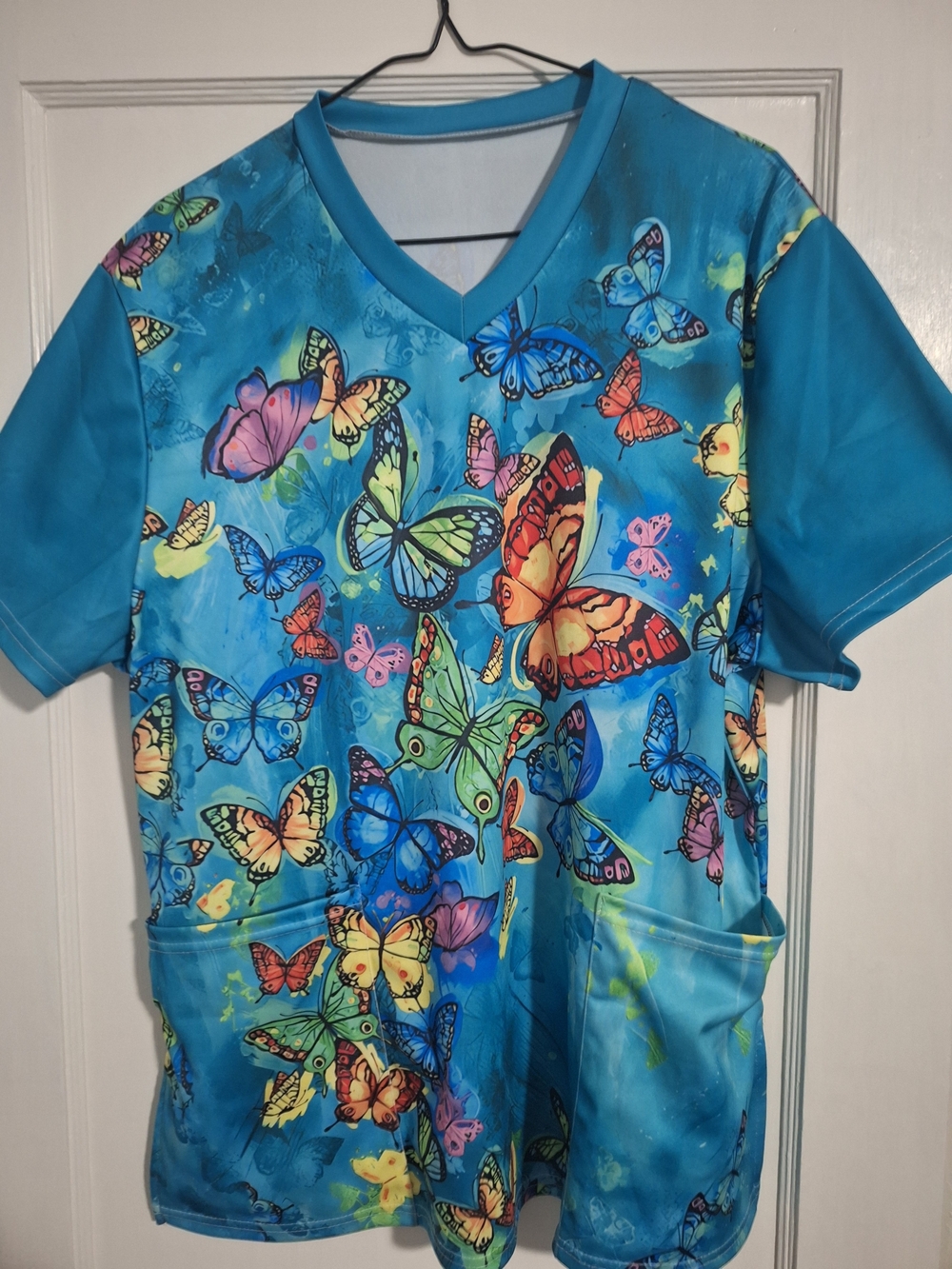 Vibrant Blue Butterfly Scrub Top